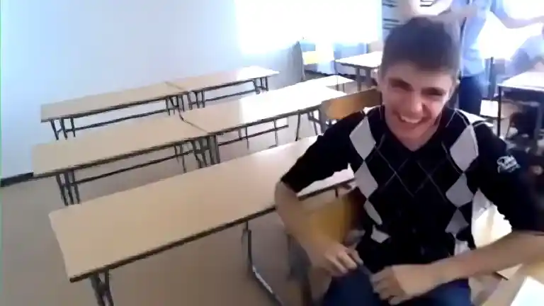 School boy laughing like crying dog meme original 480p classroom clip without filters or watermark, perfect for meme